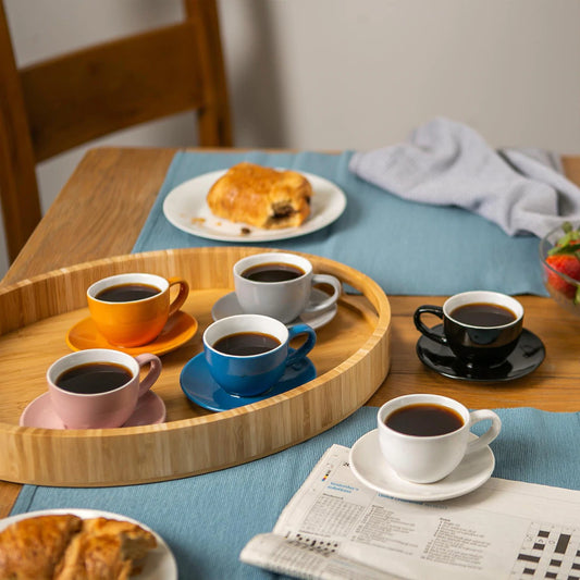 Porcelain Coloured Coffee Cup & Coloured Saucers |